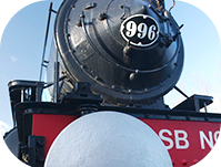 A black and red steam train at Railworld, Peterborough